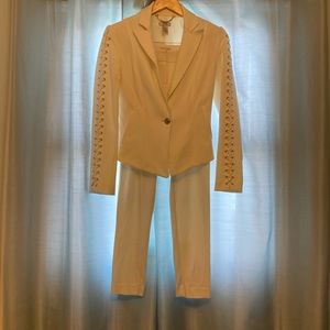 Cache suit:  Jacket size 2, legging pants size 4